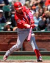 Cincinnati Reds' Jose Iglesias hits a two-run single against the San Francisco Giants during the first inning of a baseball game in San Francisco, Sunday, May 12, 2019. (AP Photo/Jeff Chiu)