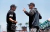 Arizona Diamondbacks manager Torey Lovullo, right, gestures while talking with umpire Mark Ripperger (90) before challenging a play during the first inning of a baseball game against the San Francisco Giants in San Francisco, Saturday, May 25, 2019. (AP Photo/Jeff Chiu)