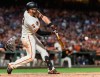 San Francisco Giants' Evan Longoria hits a two-run double against the San Diego Padres in the seventh inning of a baseball game Tuesday, June 11, 2019, in San Francisco. (AP Photo/John Hefti)