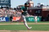Oakland Athletics' Robbie Grossman runs toward home after hitting a two-run home run against the San Francisco Giants during the sixth inning of a baseball game in San Francisco, Wednesday, Aug. 14, 2019. (AP Photo/Jeff Chiu)