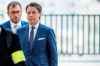 Italian Premier Giuseppe Conte (right) arrives at the G-7 summit in Biarritz, France, on Sunday. (Andrew Harnik / The Associated Press)