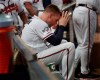 Atlanta Braves first baseman Freddie Freeman sits in the dugout during the ninth inning of the team's 13-1 loss to the St. Louis Cardinals during Game 5 of a baseball National League Division Series on Wednesday, Oct. 9, 2019, in Atlanta. (Curtis Compton/Atlanta Journal-Constitution via AP)