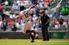 Atlanta Braves' Ronald Acuna Jr. motions to fans as he runs the bases during his home run in the first inning of a baseball game against the Milwaukee Brewers, Sunday, May 19, 2019, in Atlanta. (AP Photo/John Amis)