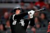 Chicago White Sox's Welington Castillo follows through on a three-run home run in the seventh inning of a baseball game against the Atlanta Braves, Friday, Aug. 30, 2019, in Atlanta. (AP Photo/John Bazemore)