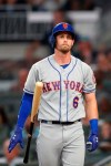 New York Mets' Jeff McNeil reacts after striking out to end the top of the fourth inning of the team's baseball game against the Atlanta Braves on Tuesday, Aug. 13, 2019, in Atlanta. The Braves won 5-3. (AP Photo/John Bazemore)