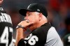 Chicago White Sox manager Rick Renteria watches from the dugout during the seventh inning of a baseball game against the Atlanta Braves, Friday, Aug. 30, 2019, in Atlanta. (AP Photo/John Bazemore)