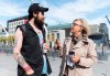 Green Party leader Elizabeth May speaks to a man during a federal election campaign stop in Montreal, Wednesday, October 9, 2019. THE CANADIAN PRESS/Graham Hughes