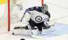 TREVOR HAGAN / WINNIPEG FREE PRESS FILES
Winnipeg Jets goaltender Connor Hellebuyck will play along with Patrik Laine and the two finalists in a single-game, two-on-two match once the championship has been settled.