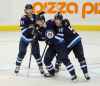 THE CANADIAN PRESS/Trevor Hagan
Winnipeg Jets' Kyle Connor, Jacob Trouba, and Mark Scheifele celebrate after Trouba scored the game winning goal Monday.