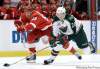 Paul Sancya / THE CANADIAN PRESS / The Associated Press
Detroit Red Wings left wing Johan Franzen (93), reaches for the puck in a game last April as Minnesota Wild right wing Antti Miettinen (20), controls it. The Winnipeg Jets have claimed Miettinen off waivers, though he will not play with them against his former team the Wild tonight.
