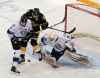 Perry Bergson/The Brandon Sun Files
Kootenay Ice goaltender Bailey Brkin and defenceman Sam Houston defend their net in Western Hockey League action against the Brandon Wheat Kings.