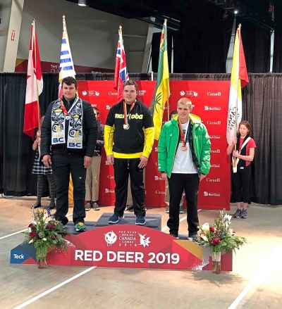 COURTESY KELLY TAYLOR
Saskatchewan's Jacob Bourassa takes bronze (right), Manitoba's Austin Taylor takes gold and B.C.'s Spencer Gamache earns the silver in archery's  individual male compound event at the Canada Winter Games.