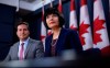 Minister of Health, Ginette Petitpas Taylor and Liberal MP Marco Mendicino, left, speak at a press conference regarding the Canada Food Guide and their letter to Conservative leader Andrew Scheer, at the National Press Theatre in Ottawa on Monday, July 22, 2019. THE CANADIAN PRESS/Justin Tang