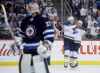 TREVOR HAGAN / WINNIPEG FREE PRESS
St. Louis Blues' Oskar Sundqvist and Jaden Schwartz celebrate after Sundqvist scored on Winnipeg Jets goaltender Connor Hellebuyck  during the first period of Game 2 of their first-round playoff series, Friday,.
