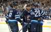CP
Winnipeg Jets defenceman Jacob Trouba (8), forward Kyle Connor (81), forward Blake Wheeler (26) and forward Mark Scheifele (55) celebrates Connor's goal against the New Jersey Devils LKJLKJ during second period NHL pre-season game action in Winnipeg, Thursday, September 27, 2017. THE CANADIAN PRESS/Jason Halstead