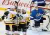 THE CANADIAN PRESS/Trevor Hagan
Pittsburgh Penguins players celebrate scoring on Winnipeg Jets goaltender Connor Hellebuyck during the third period of their game Tuesday that saw the Jets give up a 3-2 lead in the third period to eventually lose 4-5.