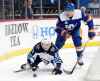 (AP Photo/Julio Cortez)
Winnipeg Jets' Sami Niku and New York Islanders' Ryan Pulock battle for the puck in the first period, Tuesday in New York. The young Manitoban has earned the trust of Islanders head coach Barry Trotz.