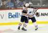 THE CANADIAN PRESS/Trevor Hagan
Edmonton Oilers' Ryan Strome and Darnell Nurse  celebrate after Nurse scored the game winning goal in overtime Tuesday.