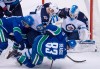 Winnipeg Jets defenceman Tyler Myers (57) stops Vancouver Canucks center Jay Beagle (83) from getting a shot on Winnipeg Jets goaltender Laurent Brossoit (30) during second period NHL action at Rogers Arena in Vancouver, Saturday, Dec. 22, 2018. THE CANADIAN PRESS/Jonathan Hayward