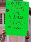 Abortion rights advocates gather. Tuesday, May 21, 2019, at the Capitol in Jackson, Miss., as they rally to voice their opposition to state legislatures passing abortion bans. (AP Photo/Rogelio V. Solis)