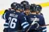 THE CANADIAN PRESS/John Woods
Winnipeg Jets' Mark Scheifele, Blake Wheeler, Nikolaj Ehlers, Jacob Trouba and Josh Morrissey celebrate Scheifele's goal during the first period against the Colorado Avalanche Friday.