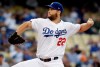 Los Angeles Dodgers starting pitcher Clayton Kershaw throws to a San Diego Padres batter during the first inning of a baseball game Tuesday, May 14, 2019, in Los Angeles. (AP Photo/Marcio Jose Sanchez)
