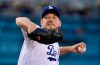 Los Angeles Dodgers' Rich Hill throws during the first inning of the team's baseball game against the San Francisco Giants on Wednesday, June 19, 2019, in Los Angeles. (AP Photo/Mark J. Terrill)