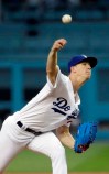Los Angeles Dodgers starting pitcher Walker Buehler throws to a Colorado Rockies batter during the first inning of a baseball game Friday, June 21, 2019, in Los Angeles. (AP Photo/Marcio Jose Sanchez)
