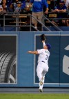 Los Angeles Dodgers right fielder Joc Pederson makes the catch on a ball hit by St. Louis Cardinals' Andrew Knizner during the seventh inning of a baseball game Tuesday, Aug. 6, 2019, in Los Angeles. (AP Photo/Mark J. Terrill)