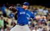Toronto Blue Jays starting pitcher Buddy Boshers throws to a Los Angeles Dodgers batter during the first inning of a baseball game Tuesday, Aug. 20, 2019, in Los Angeles. (AP Photo/Marcio Jose Sanchez)
