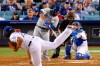 Toronto Blue Jays' Rowdy Tellez hits a solo home run off Los Angeles Dodgers relief pitcher Kenley Jansen, foreground, during the ninth inning of a baseball game Wednesday, Aug. 21, 2019, in Los Angeles. (AP Photo/Mark J. Terrill)