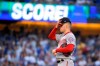 Washington Nationals starting pitcher Patrick Corbin reacts after waking in a run during the first inning against the Los Angeles Dodgers in Game 1 in baseball's National League Divisional Series on Thursday, Oct. 3, 2019, in Los Angeles. (AP Photo/Mark J. Terrill)