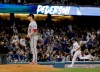 Washington Nationals starting pitcher Anibal Sanchez, left, stands on the mound after giving up a solo home run to Los Angeles Dodgers' Joc Pederson, right, during the fifth inning of a baseball game Friday, May 10, 2019, in Los Angeles. (AP Photo/Marcio Jose Sanchez)
