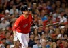 Boston Red Sox's J.D. Martinez watches his two-run home run during the fourth inning of the team's baseball game against the Los Angeles Angels at Fenway Park, Friday, Aug. 9, 2019, in Boston. (AP Photo/Elise Amendola)