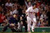Boston Red Sox's Rafael Devers watches his three-run home run in front of Minnesota Twins catcher Jason Castro during the fifth inning of a baseball game at Fenway Park, Tuesday, Sept. 3, 2019, in Boston. (AP Photo/Elise Amendola)