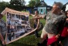 Phil Hossack / Winnipeg Free Press
Rene Dubois points to a photo quilt his family made of Makoon's stay with him after the black bear cub found in a ditch near St Malo. Protestors gathered in front of the Assiniboine Park Zoo Wednesday to protest the province's handling of Makoon.