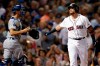 Boston Red Sox's Christian Vazquez, right, reacts beside Los Angeles Dodgers' Austin Barnes after striking out swinging during to end the sixth inning of a baseball game in Boston, Saturday, July 13, 2019. (AP Photo/Michael Dwyer)