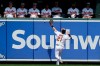 Baltimore Orioles' Austin Hays is unable to catch up with a long fly ball hit by Seattle Mariners' Shed Long in the first inning of a baseball game, Sunday, Sept. 22, 2019, in Baltimore. (AP Photo/Gail Burton)