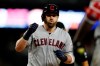 Cleveland Indians' Jason Kipnis arrives a home plate after a solo home run during the ninth inning of a baseball game against the Detroit Tigers, Wednesday, Aug. 28, 2019, in Detroit. (AP Photo/Carlos Osorio)