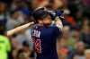 Minnesota Twins' C.J. Cron watches his three-run home run during the fourth inning of the team's baseball game against the Detroit Tigers, Friday, Aug. 30, 2019, in Detroit. (AP Photo/Carlos Osorio)