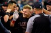 Cleveland Indians' Jake Bauers, center, is congratulated by teammates after hitting a two-run home run against the Detroit Tigers in the top of the eighth inning of a baseball game, Friday, June 14, 2019, in Detroit. (AP Photo/Jose Juarez)