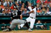 Detroit Tigers' Travis Demeritte slides safely into home plate ahead of the tag by Chicago White Sox catcher James McCann (33) in the second inning of a baseball game in Detroit, Monday, Aug. 5, 2019. (AP Photo/Paul Sancya)
