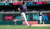 Minnesota Twins' Max Kepler, left, jogs home on his three-run home run off Chicago White Sox pitcher Josh Osich, right, in the seventh inning of a baseball game Sunday, May 26, 2019, in Minneapolis. The Twins won 7-0. (AP Photo/Jim Mone)