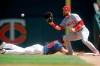 Minnesota Twins' Max Kepler,left, drives safely back to first base as Los Angeles Angels first baseman Jared Walsh, making his major league debut, awaits the ball in a baseball game Wednesday, May 15, 2019, in Minneapolis. (AP Photo/Jim Mone)