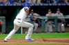 Kansas City Royals' Nicky Lopez hits an RBI bunt single during the fourth inning of the team's baseball game against the Atlanta Braves on Wednesday, Sept. 25, 2019, in Kansas City, Mo. (AP Photo/Charlie Riedel)