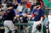 Boston Red Sox relief pitcher Ryan Brasier, right, celebrates with catcher Christian Vazquez after the team's baseball game against the Kansas City Royals on Tuesday, June 4, 2019, in Kansas City, Mo. The Red Sox won 8-3. (AP Photo/Charlie Riedel)