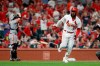 St. Louis Cardinals' Marcell Ozuna, right, drops his bat after hitting a solo home run as San Francisco Giants catcher Stephen Vogt, left, stands at the plate during the sixth inning of a baseball game Tuesday, Sept. 3, 2019, in St. Louis. (AP Photo/Jeff Roberson)