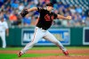 Baltimore Orioles starting pitcher John Means delivers to a Kansas City Royals batter during the first inning of a baseball game at Kauffman Stadium in Kansas City, Mo., Friday, Aug. 30, 2019. (AP Photo/Orlin Wagner)