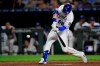 Kansas City Royals' Ryan O'Hearn hits a solo home run off Oakland Athletics starting pitcher Tanner Roark during the sixth inning of a baseball game at Kauffman Stadium in Kansas City, Mo., Wednesday, Aug. 28, 2019. (AP Photo/Orlin Wagner)