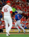 Chicago Cubs' Ian Happ (8) runs the bases after hitting a solo home run off St. Louis Cardinals relief pitcher Giovanny Gallegos (65) during the sixth inning of a baseball game Friday, Sept. 27, 2019, in St. Louis. (AP Photo/Scott Kane)